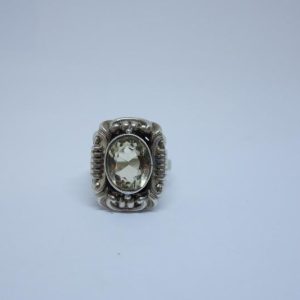 Bague argent citrine et monture volutes.