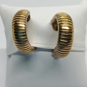 Boucles d&rsquo;oreilles, clip, modèle façon tubogaz, vers 1940-50.