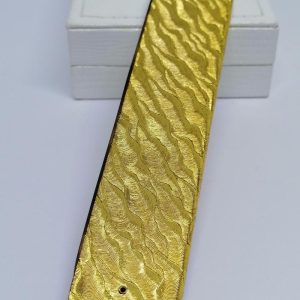 Peigne de poche féminin, monture laiton doré et ouvragé.