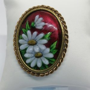 Broche en laiton et émaux sur cuivre, motif floral, 1900-20.