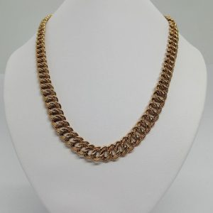 Collier maille gourmette travaillée, plaqué or, de marque Mûrat.