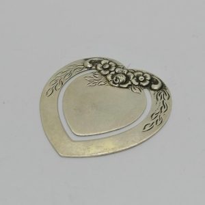 Pince-billets, argent, décor de fleurs, vers 1920.