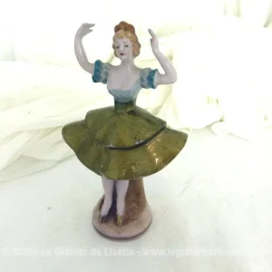 Figurine céramique danseuse jupe dorée